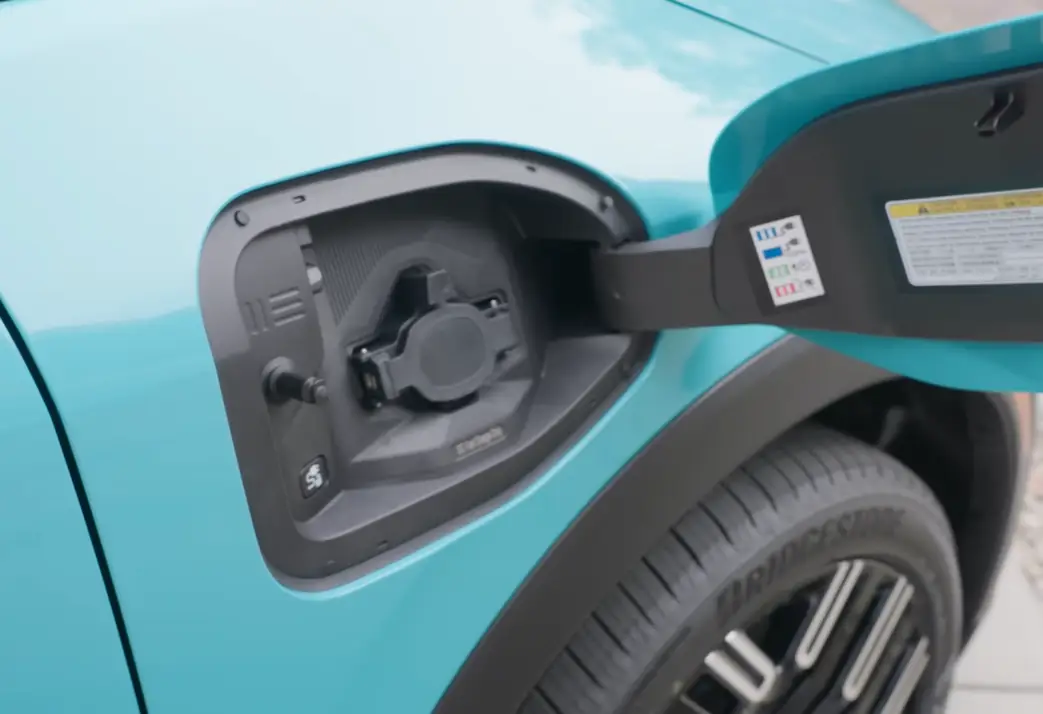 Nissan Leaf charging port NACS native port Tesla Supercharger access 150 kW DC fast charge 10 to 80 percent 35 minutes