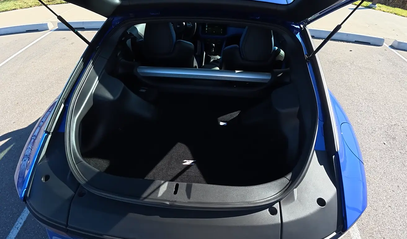 Nissan Z Sport 2026 cargo space showing sports coupe trunk access and practical storage context as the 400 hp honorable mention that may exceed 40000 at local dealer markups in the best affordable coupe under 40000 2026 ranking