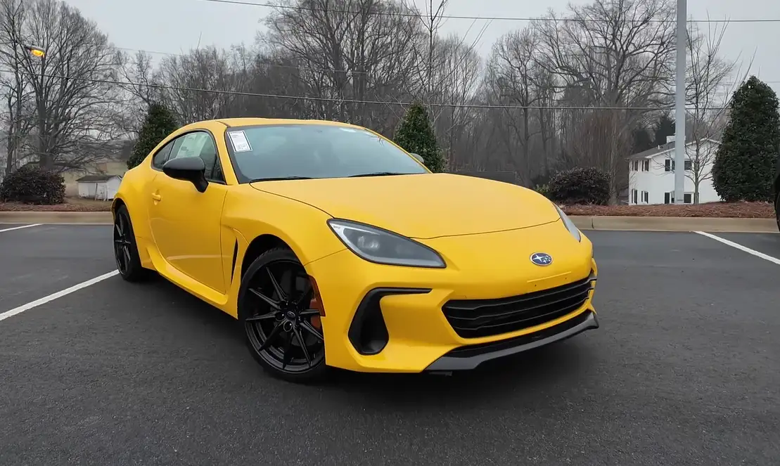 Subaru BRZ 2026 exterior showing 35860 starting price 228 hp shared platform with Toyota GR86 stiffer front springs for more stable highway feel and slightly more refined interior for daily commuting compared to track-focused GR86