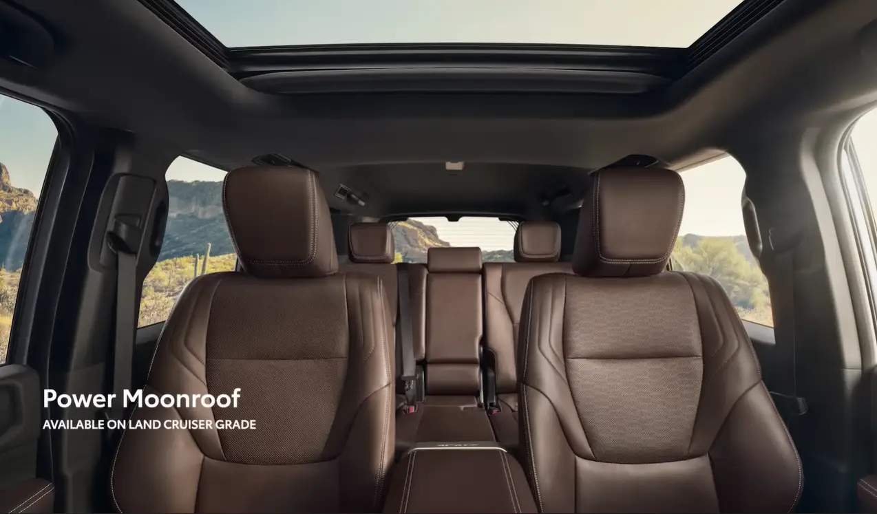 Toyota Land Cruiser 2026 seating space showing 5-passenger cabin no third-row option high cargo floor due to battery placement Heritage Blue color option and comfortable interior built for small families who love outdoors and paved road daily driving