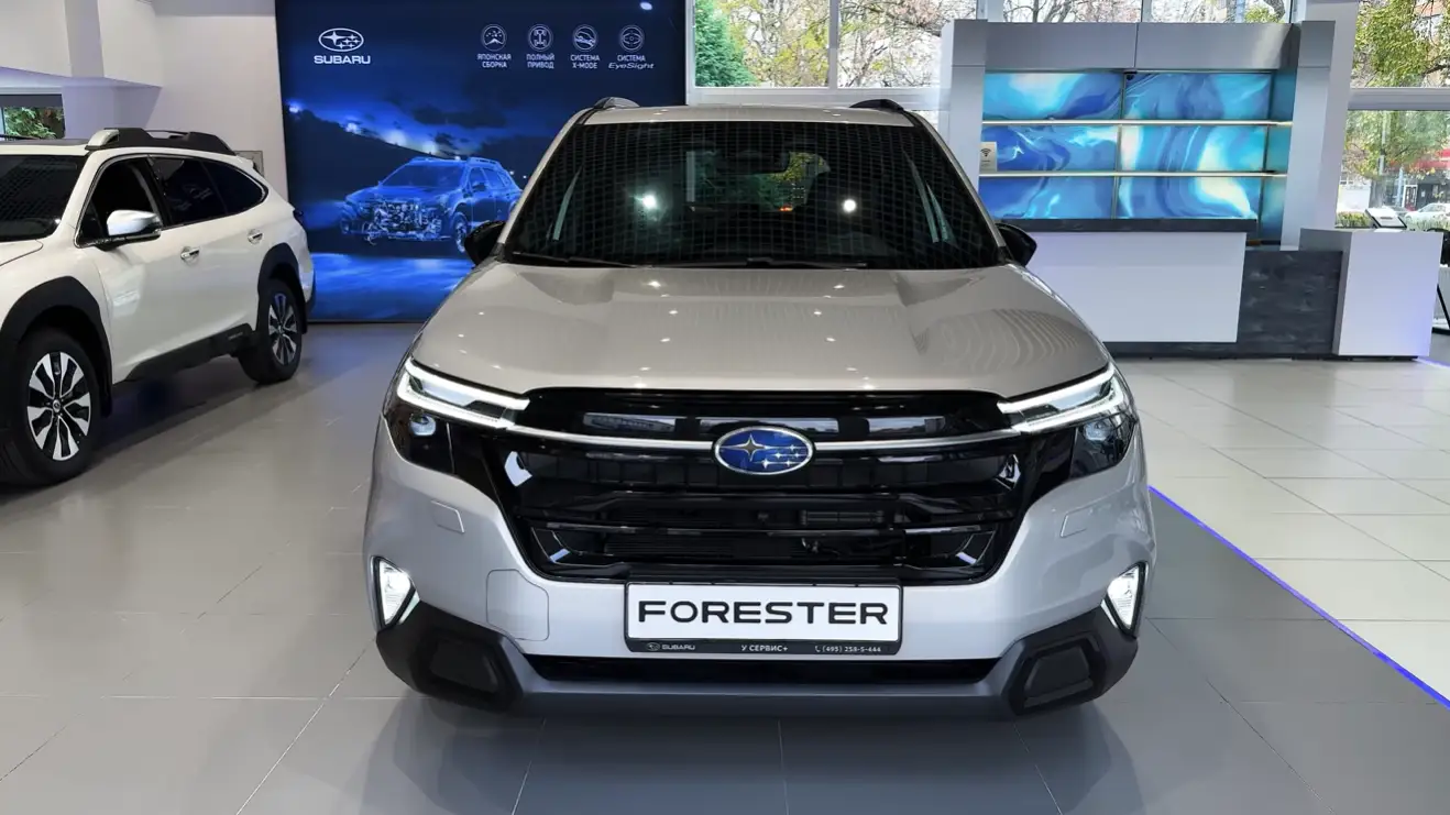 2026 Subaru Forester Hybrid exterior showing standard Symmetrical AWD on all trims 8.7 to 9.3 inches ground clearance EyeSight safety suite and best hybrid SUV under 45000 for outdoor adventure drivers