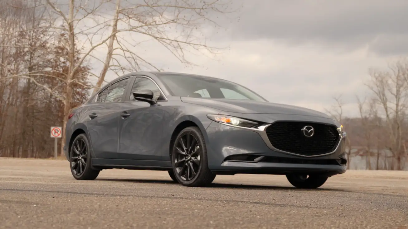 Mazda3 2026 best premium feel budget commuter car under 35000 showing near luxury interior quality 186 hp 2.5L engine i-Activsense safety standard AWD available and quietest cabin of the top five picks