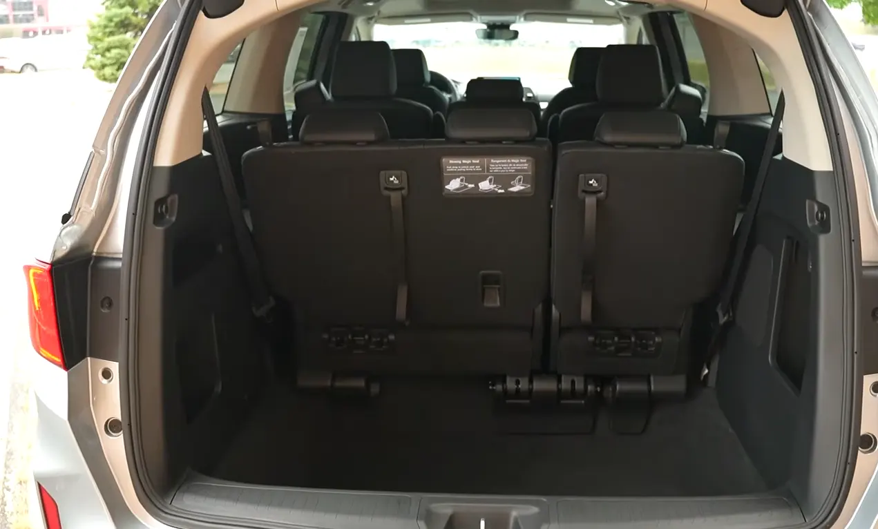 2026 Honda Odyssey facelift cargo space showing 38.6 cubic feet behind the third row expanding to 158 cubic feet with seats folded making it the segment leader for big families needing maximum hauling capacity