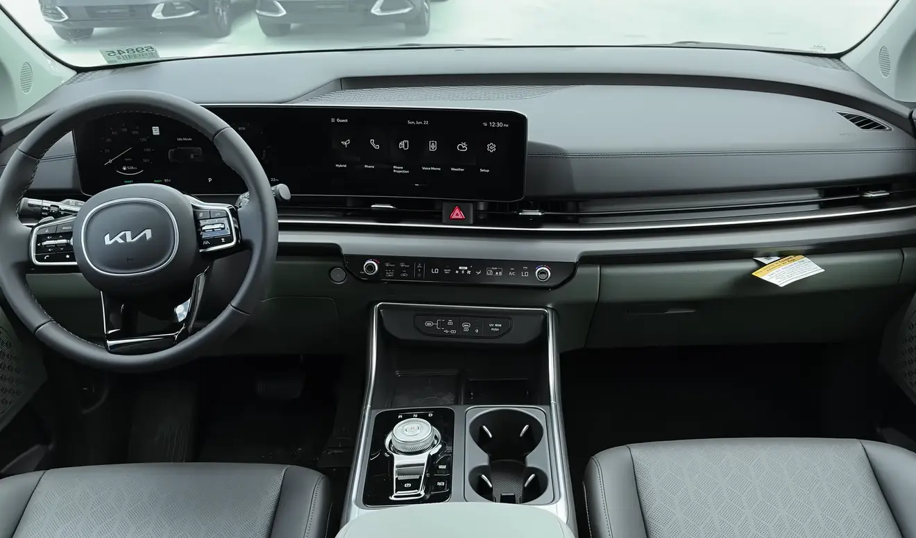 Kia Carnival 2026 interior showing SX Prestige VIP captain chairs with leg rests limo-like rear legroom for tall teens premium materials and 8-passenger layout that gives real comfort to every occupant
