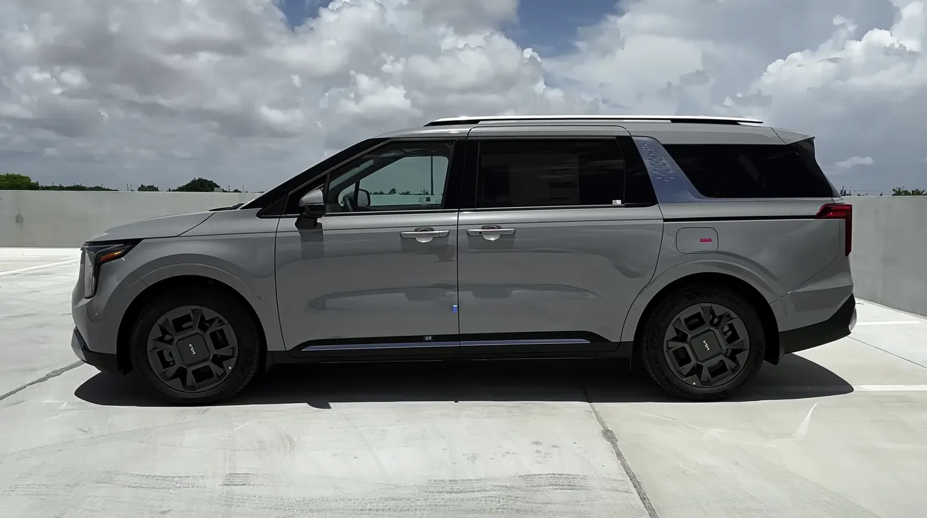 Kia Carnival 2026 starting at 38490 with 8 seats limo-like rear legroom for tall teens SX Prestige VIP captain chairs with leg rests 40.2 cubic feet cargo and 10 year 100000 mile powertrain warranty