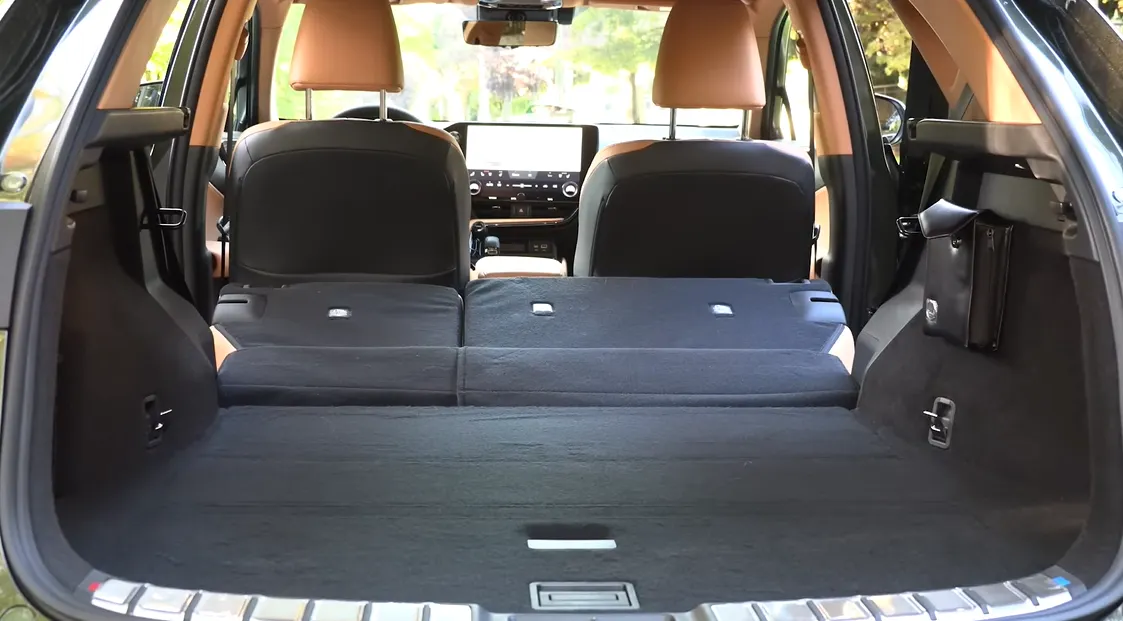 Lexus NX 350h 2026 cargo space showing 22.7 cubic feet behind rear seats making it best luxury hybrid under 50k for daily commuters who need cargo room and want to spend less on gas compared to BMW X3 or Volvo XC60