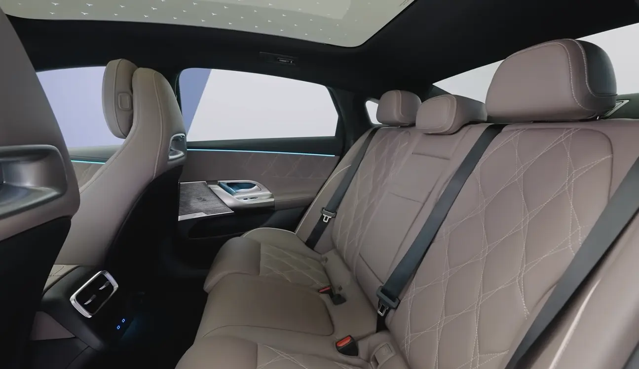 Mercedes C300 2026 rear seat showing premium sedan passenger cabin whisper quiet at highway speed floating ride quality and comfortable seating layout for long road trips where passenger pampering is the priority
