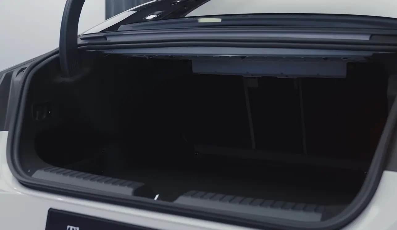 Mercedes C300 2026 cargo space showing about 12 cubic feet trunk smaller than BMW 330i 17 cubic feet but sufficient for solo and couple use in the entry luxury sedan class with premium refinement compensating for the space difference