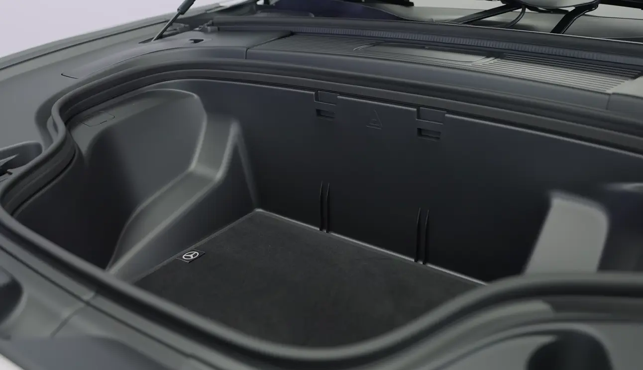 Mercedes C300 2026 front view and boot access showing about 12 cubic feet trunk space modest compared to BMW 330i 17 cubic feet but compensated by premium interior quality MBUX tech and floating highway ride for long-distance comfort buyers