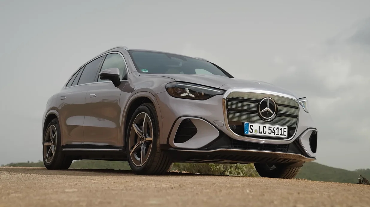 Mercedes C300 2026 exterior showing entry luxury sedan starting at about $49,650 with 255 hp 2.0L turbo 48V mild hybrid portrait MBUX screen ambient lighting soft door tops and quiet highway cabin best for weekend road trippers and tech lovers