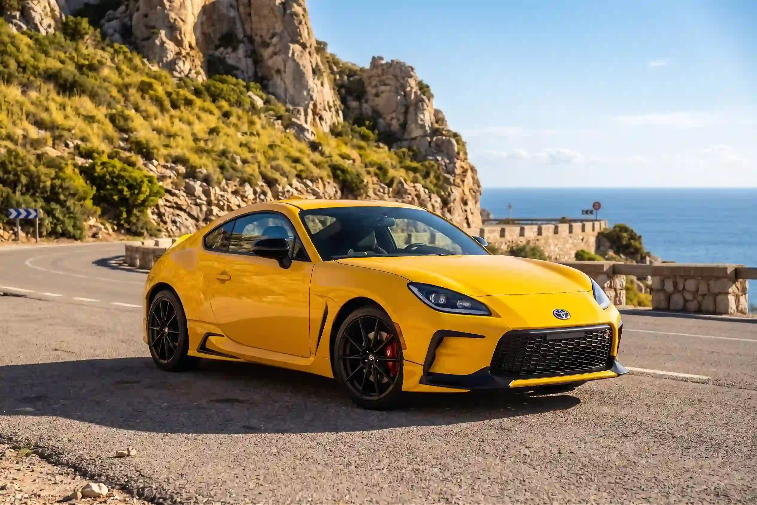 Toyota GR86 2026 starting at 31200 lightest car in the GR lineup at 2838 lbs 228 hp 2.4L naturally aspirated flat-four Torsen differential standard 6-speed manual kart-like corner turn-in and IIHS strong scores in front and side crash tests
