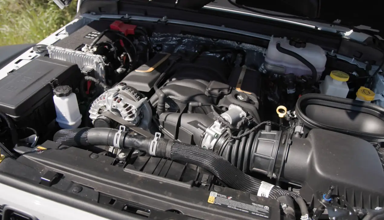 2026 Jeep Wrangler engine options 2.0T four 3.6L V6 4xe plug-in hybrid fuel economy city driving electric range