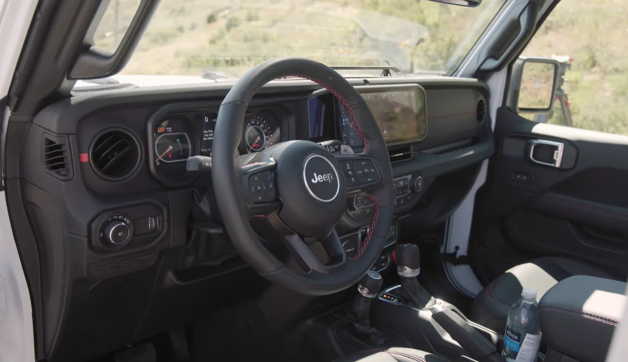 2026 Jeep Wrangler interior Uconnect infotainment rugged washable cabin removable doors roof everyday usability