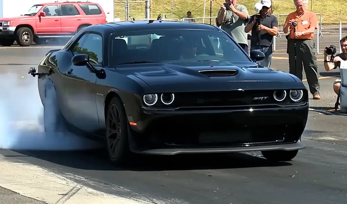 Dodge Charger SRT Hellcat 707 horsepower supercharged 6.2L V8 Furious 7 modern American muscle four-door sedan beast