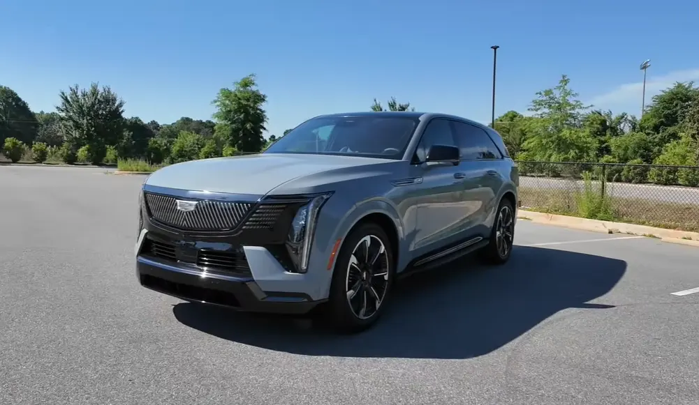 2026 Cadillac Escalade IQ front view full-size luxury electric SUV price range 450 miles AWD interior specs buying guide