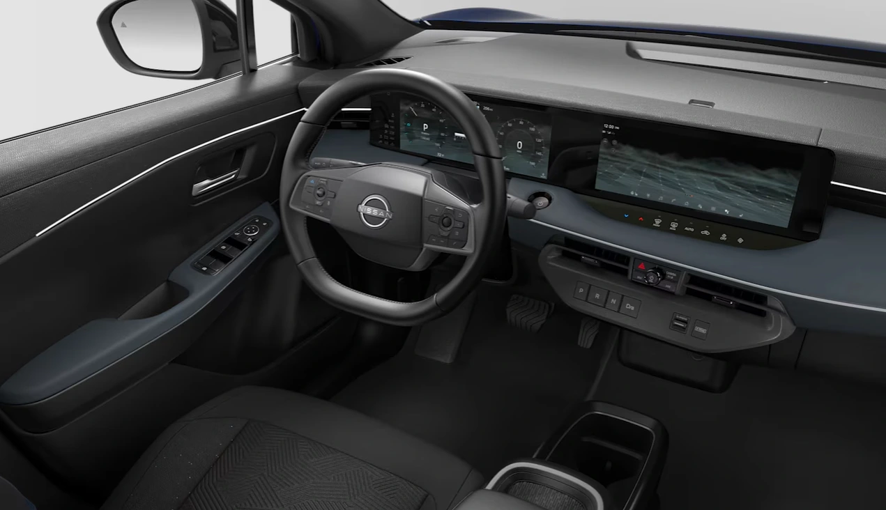 2026 Nissan Leaf crossover interior twin screens Google built-in wireless CarPlay softer trim recycled cloth faux leather modern cabin