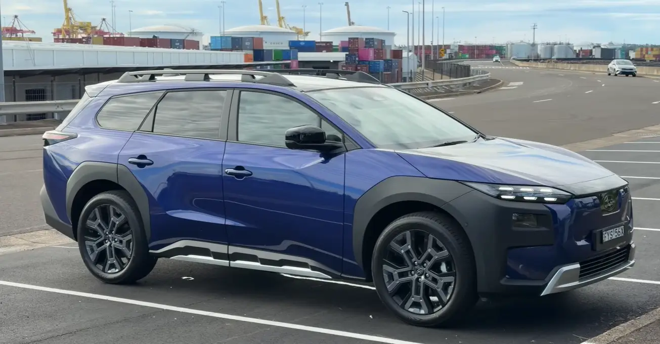 2026 Subaru Trailseeker EV side view rugged outdoor shape cladding tall roof short overhangs trail attitude Subaru adventure EV