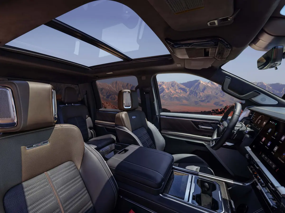 2027 GMC Sierra AT4X Timber Mahogany interior with panoramic sunroof