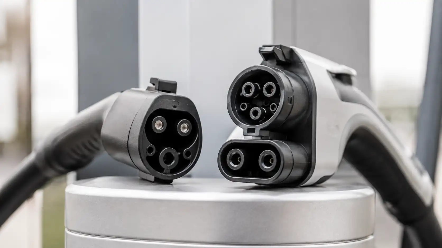 Comparison of NACS and CCS electric vehicle charging connector types J3400 SAE standard adapter compatibility 2026 guide