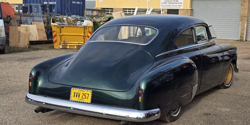Dark green 1951 Chevrolet Fleetline seen from the rear, same model as Dom's car in the Havana street race
