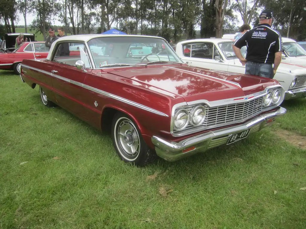 1964 Chevrolet Impala - front 3/4 exterior, another car (1964 Impala SS hardtop)