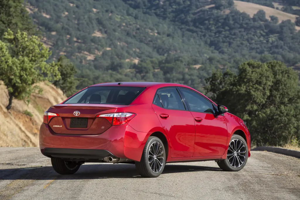 2014 Toyota Corolla S Used Buyer's Guide - 2014 Corolla S, rear 3/4 on road (red)