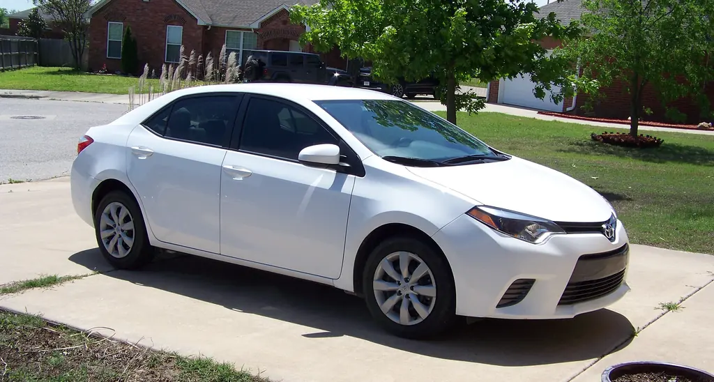 2016 Toyota Corolla Used Buyer's Guide - US-market 2016 Corolla LE, front 3/4 (white)