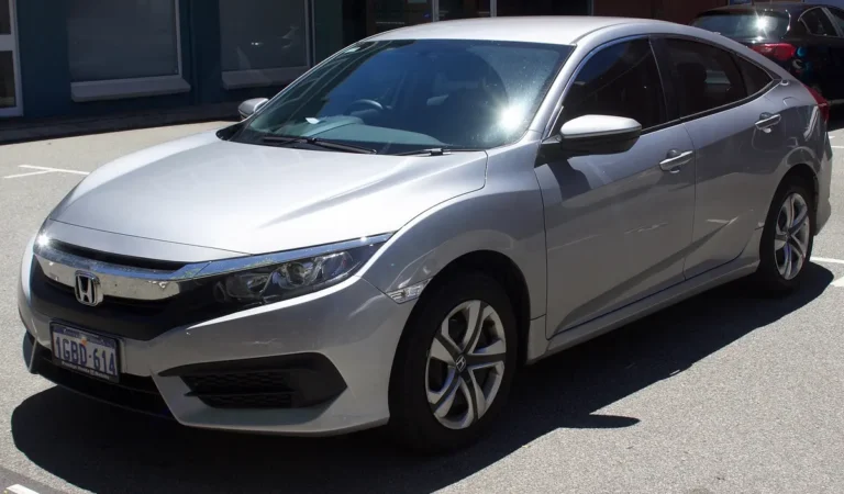 2017 Honda Civic (10th gen FC sedan, 2016-2018 pre-facelift) - front 3/4, exterior (sedan)