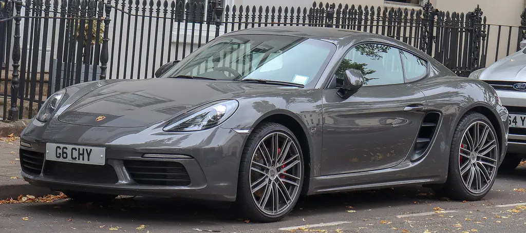 2018 Porsche 718 Cayman S (982) - front 3/4 exterior, grey