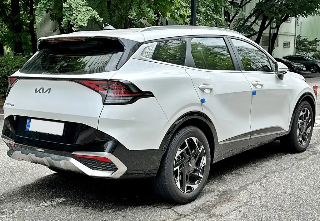 2023 Kia Sportage (NQ5, US) - rear 3/4 exterior, white