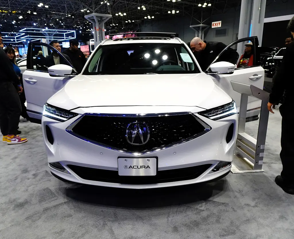2024 Acura MDX SH-AWD Advance (4th gen) - front exterior with doors open (auto show)