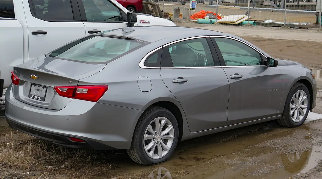 2024 Chevrolet Malibu 1LT (9th gen facelift) - rear 3/4 exterior, Sterling Grey