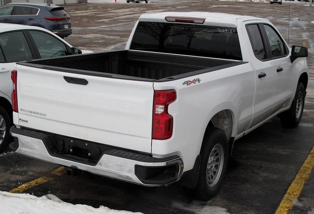 2024 Chevrolet Silverado 1500 WT (4th gen T1 refresh, 2022+ MY) - rear 3/4 exterior, Summit White