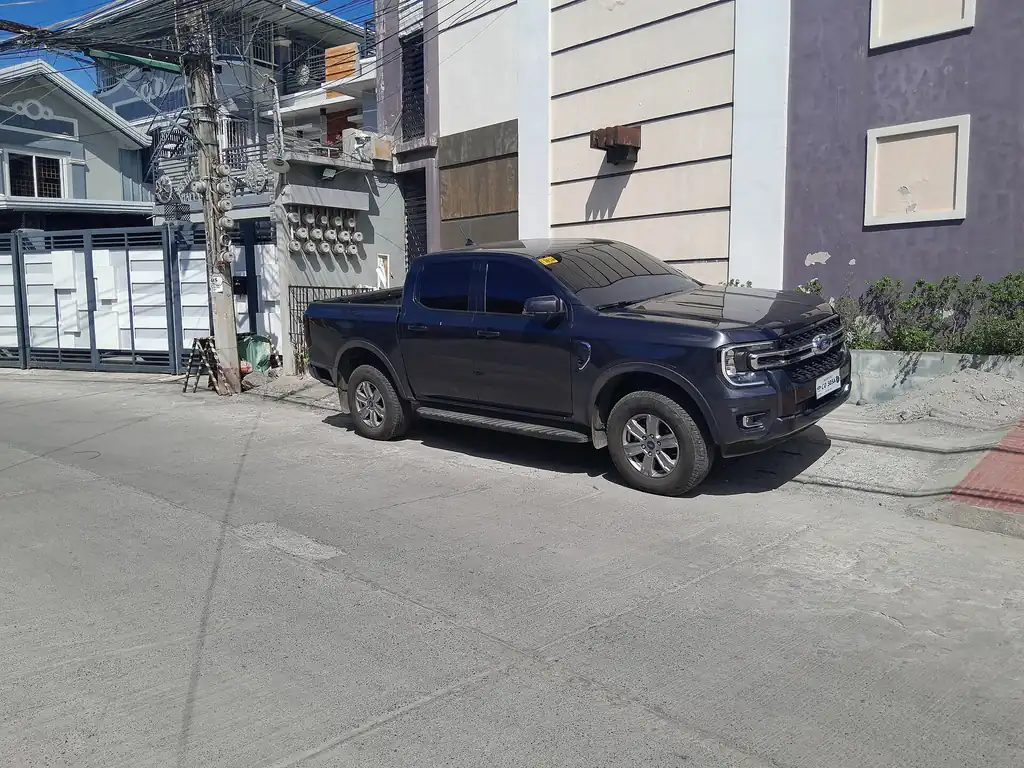 2024 Ford Ranger XLT - front 3/4 exterior, another angle (P703 2024 XLT, Philippines)