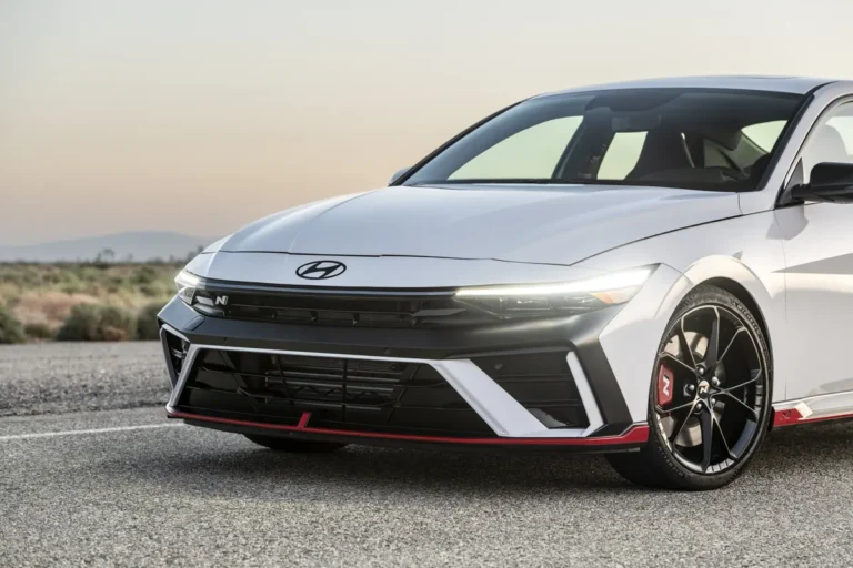 2024 Hyundai Elantra N Review - front 3/4, Atlas White, static at dusk (3500 px, featured)