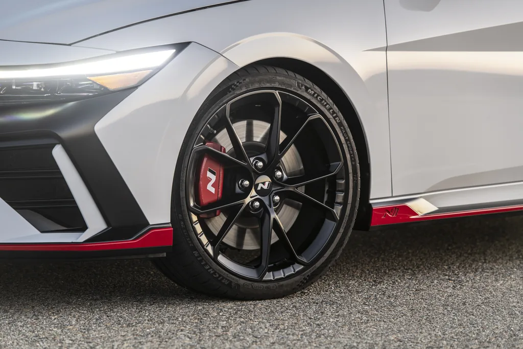 2024 Hyundai Elantra N Review - detail: 19-inch forged wheel, red N brake caliper, front bumper