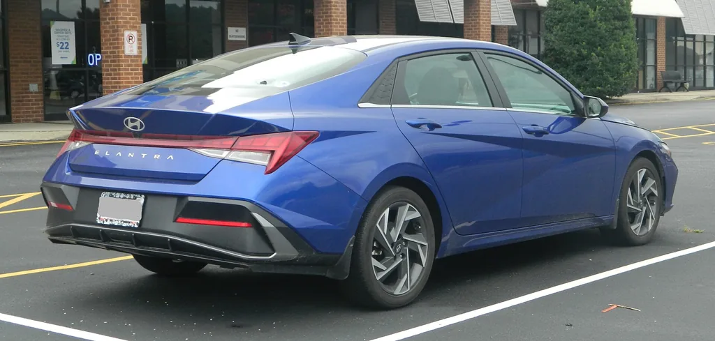 2024 Hyundai Elantra SEL (CN7 facelift) - rear 3/4 exterior, blue