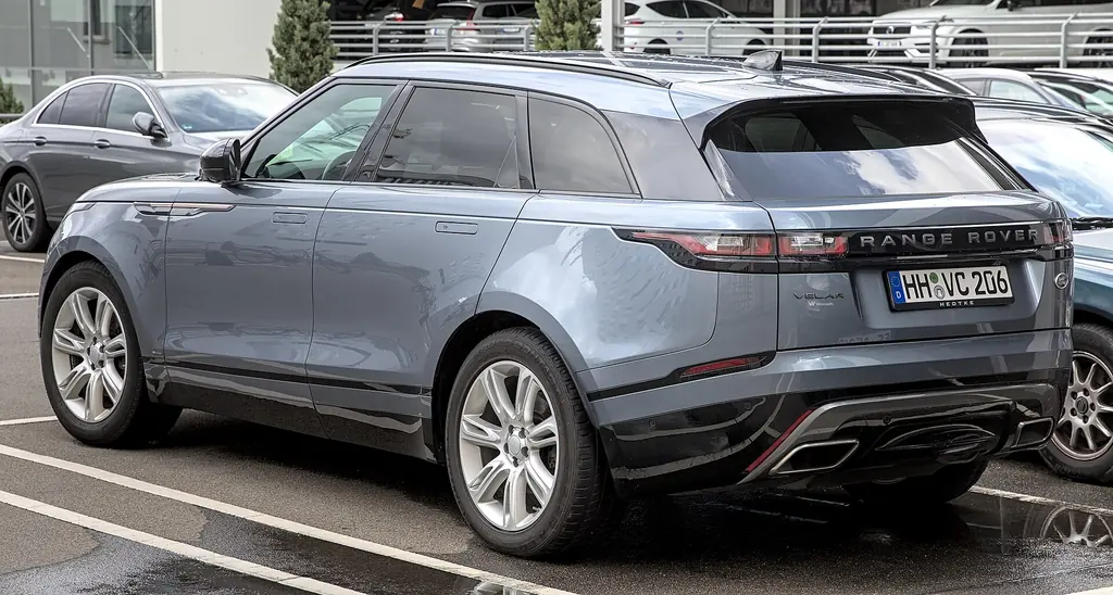 2024 Range Rover Velar (L560 facelift) - rear 3/4 exterior, blue-grey