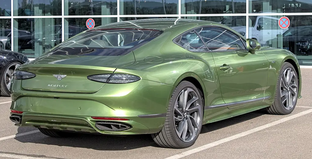2025 Bentley Continental GT - rear 3/4 exterior (4th gen, green)