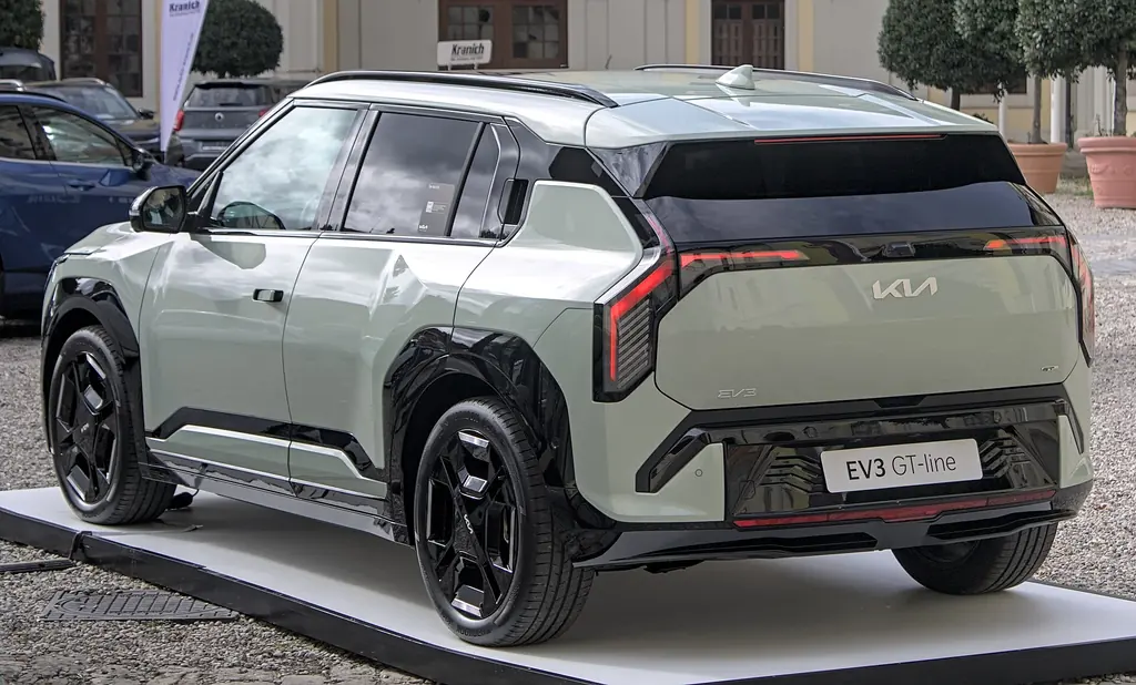 2025 Kia EV3 GT-Line - rear 3/4 exterior (show stand)