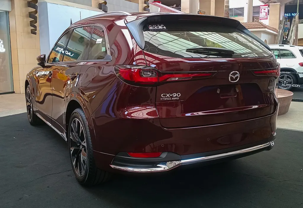2025 Mazda CX-90 (1st gen, 2024+ MY) - rear 3/4 exterior, Artisan Red