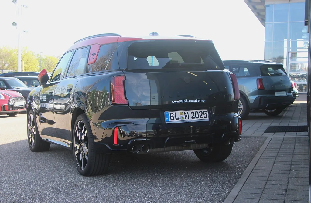 2025 MINI Countryman John Cooper Works (U25) - rear 3/4 exterior, black