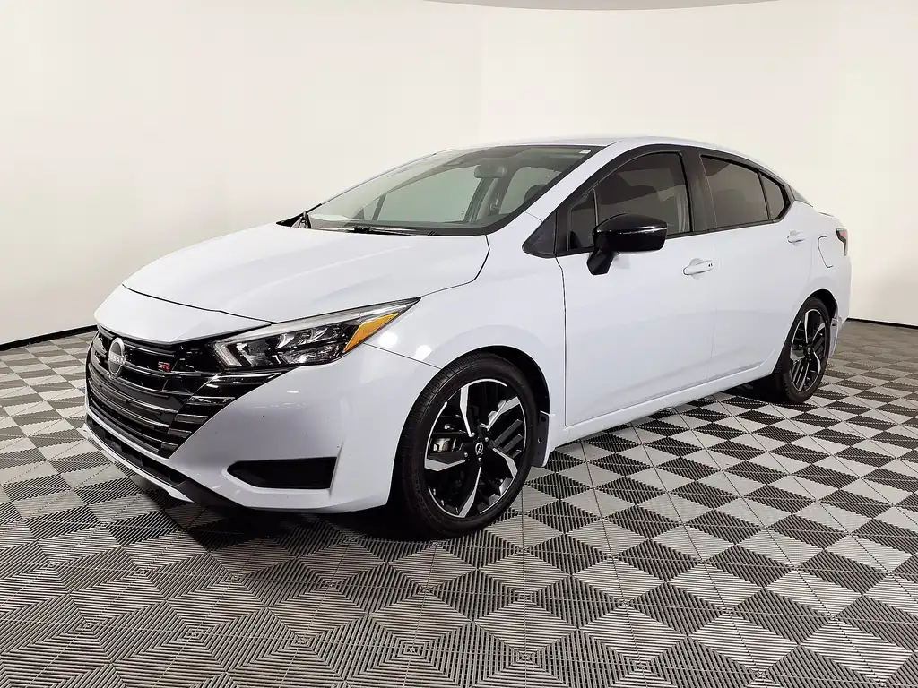 2025 Nissan Versa - front 3/4 exterior, SR trim (studio)