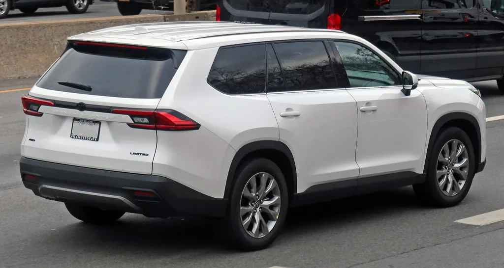 2025 Toyota Grand Highlander Hybrid - rear 3/4 exterior (Limited, different color)