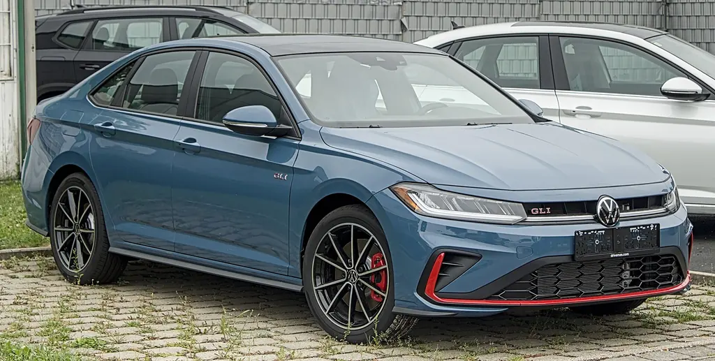 2025 Volkswagen Jetta GLI (A7 facelift) - front 3/4 exterior, blue