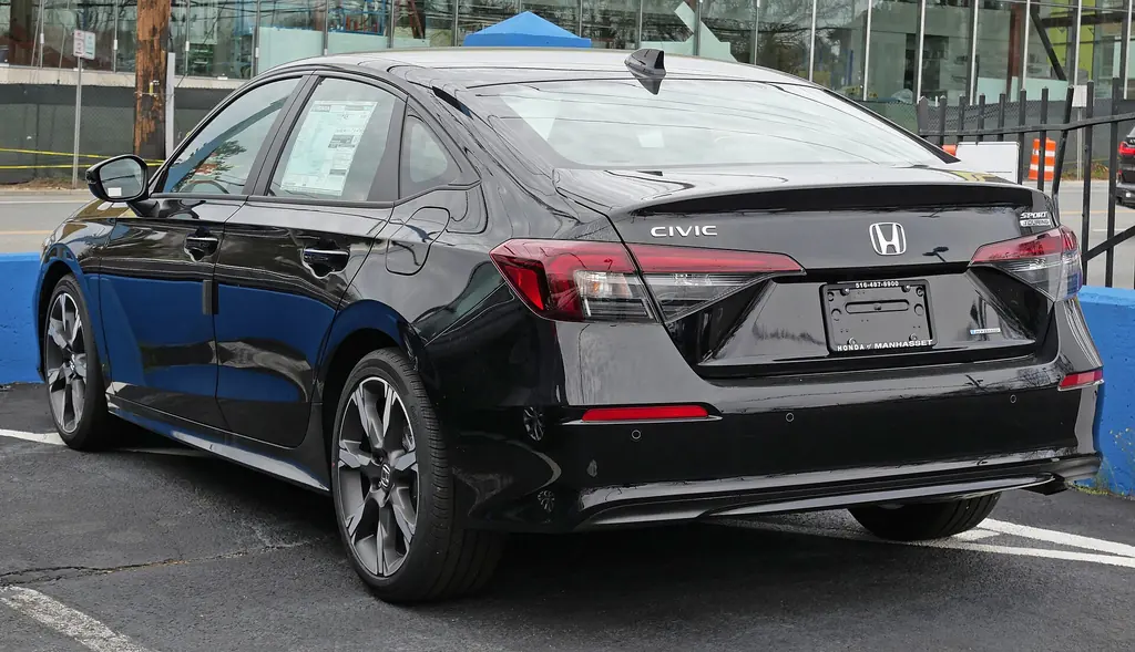 2026 Honda Civic Hybrid - rear 3/4 exterior (11th gen 2025+ facelift, Sport Touring Hybrid sedan)