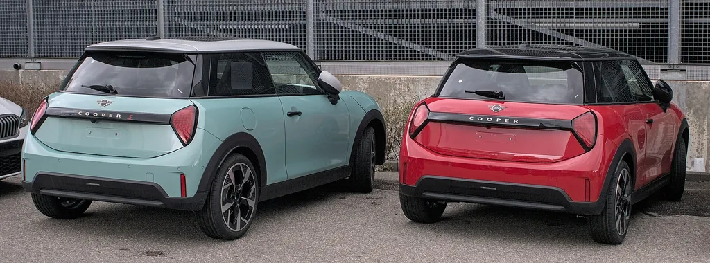 2026 Mini Cooper - rear 3/4 exterior, two cars (F66 hatch)