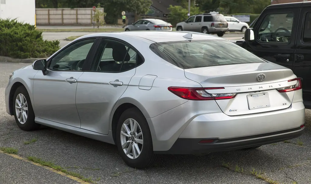 2026 Toyota Camry Hybrid - rear 3/4 exterior (9th gen XV80 2025+, LE)