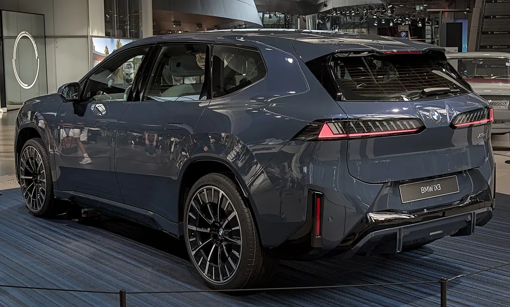 BMW iX3 (NA5, Neue Klasse) - rear 3/4 exterior, second color (IAA 2025)