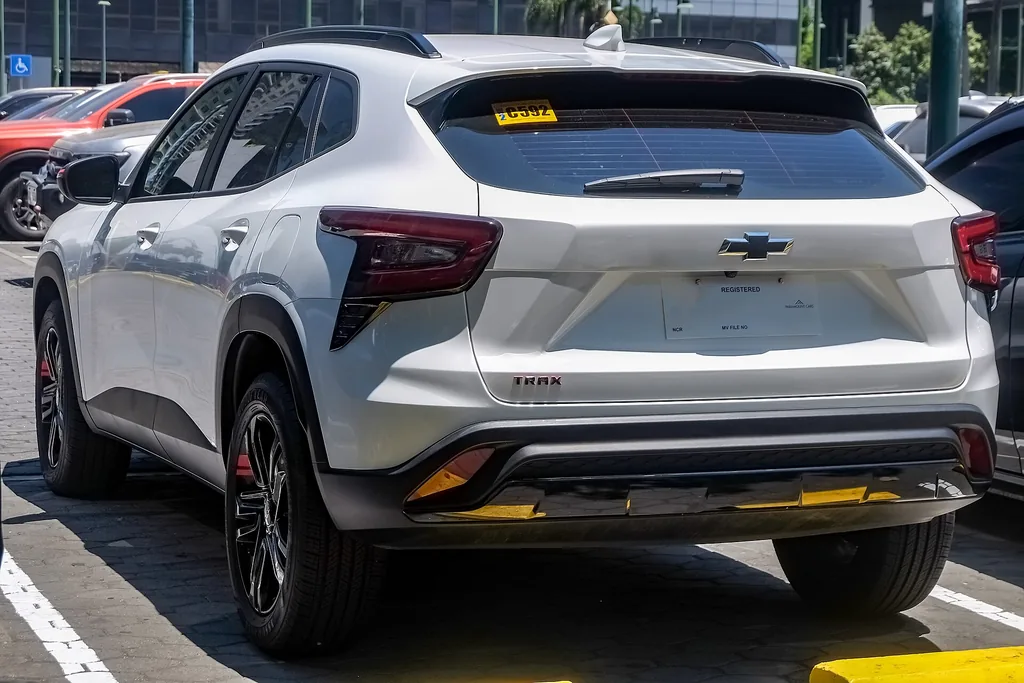 Chevrolet Trax Redline / RS-style trim (2nd gen) - rear 3/4 exterior, white with red accents